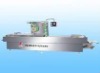 Automatic continuous stretch-packing machine for food