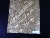 Embossed paper laminated aluminum foil