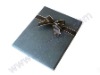 metallic edge satin ribbon bow with elastic used in gift packaging