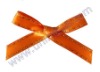 pre-tied mini orange ribbon bows with self-adhesive backs