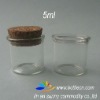 small glass vial with cork